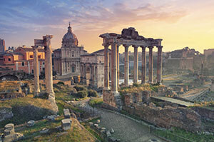 The remains of the Roman Forum in Rome during the sunset.