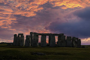 The ruins of Stonehenge during sunset.