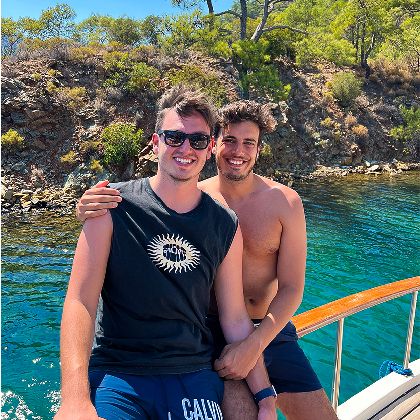 A couple posing for a picture together.
