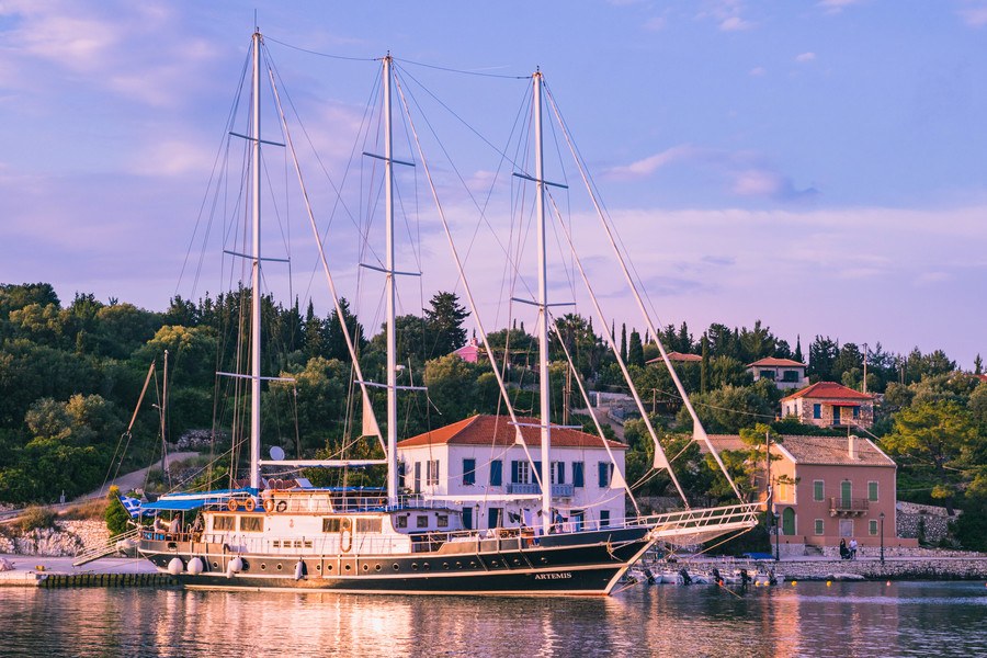 Boat docked at Greek Island port.