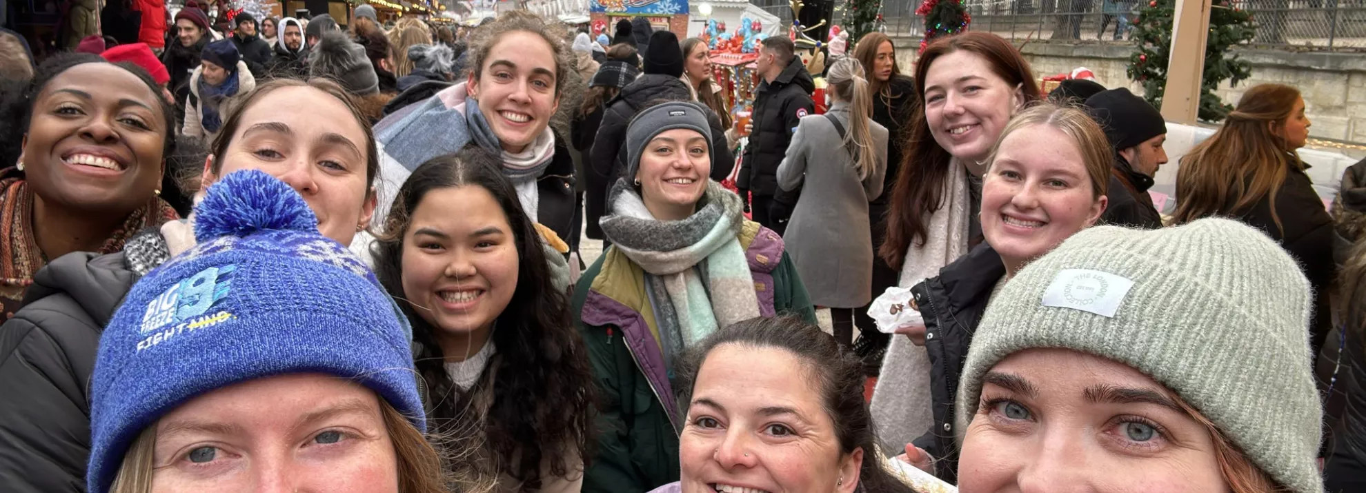 Group selfie at a Christmas market