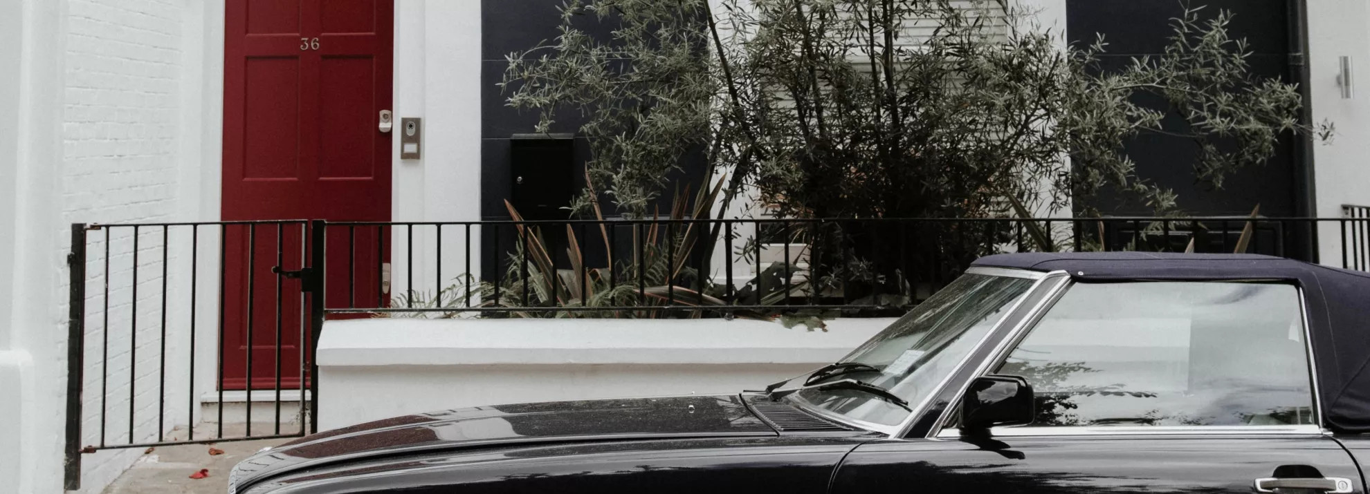Black car parked on a street