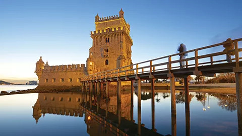 Stone castle like building known as Belém Tower in Lisb