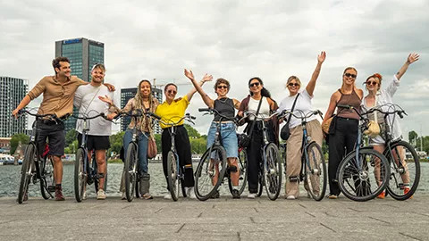 Nine people on a bike tour of Amsterdam