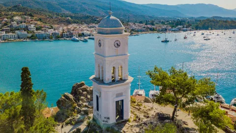 Clock Tower of Poros Island overlooking the Saronic Gulf.