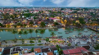 Buildings along the river in the town of Hoi An in Vietnam at night.