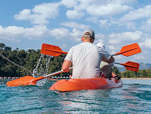 A photo of Topdeck travelers kayaking in Southern Thailand.