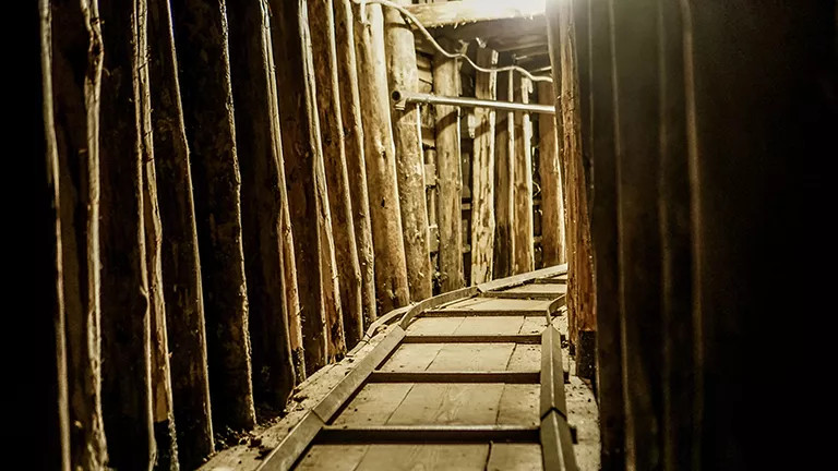 Inside wooden supporting structure of the Sarajevo Tunnel.