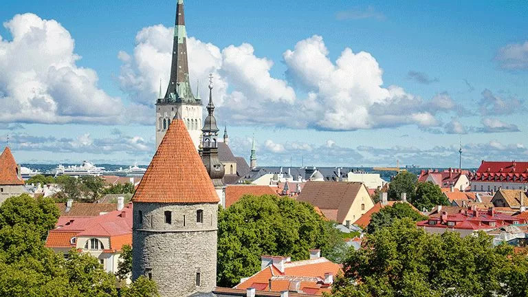 Estonia’s cityscape with red and orange rooves and large turrets.