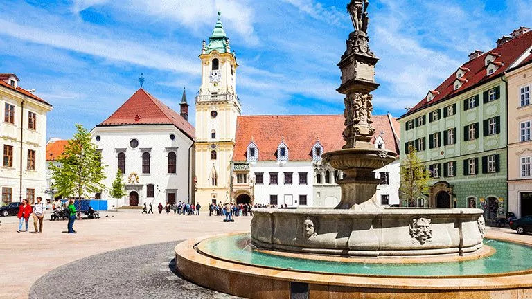 Water fountain in the middle of an open square in Bratislava town.