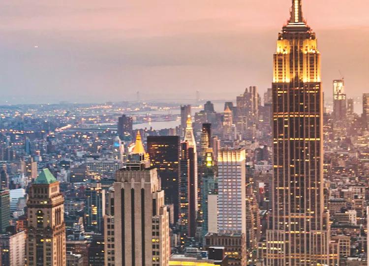 A view of the New York City skyline, with the Empire State Building featuring prominently.