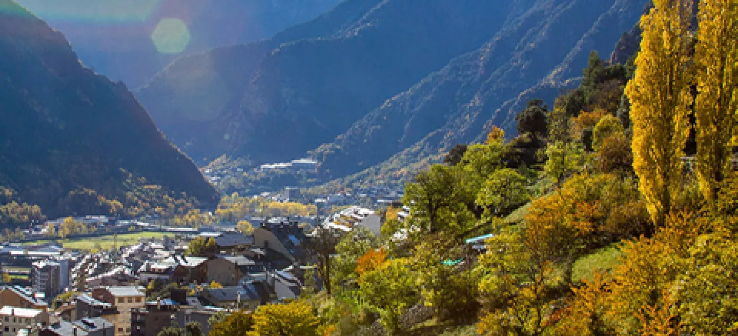 Andora hillside with buildings within the lower valley.
