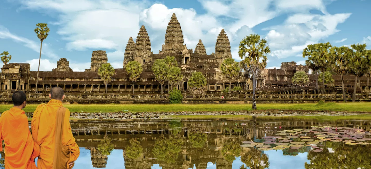 Two monks looking at Angkor Wat in Siem Reap