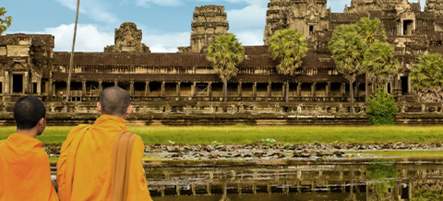 Two monks looking at Angkor Wat in Siem Reap