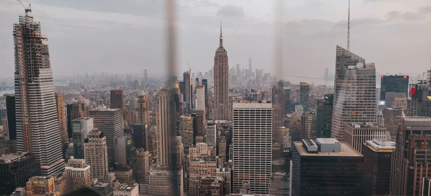 City view of Manhattan with the Empire State building in the center.