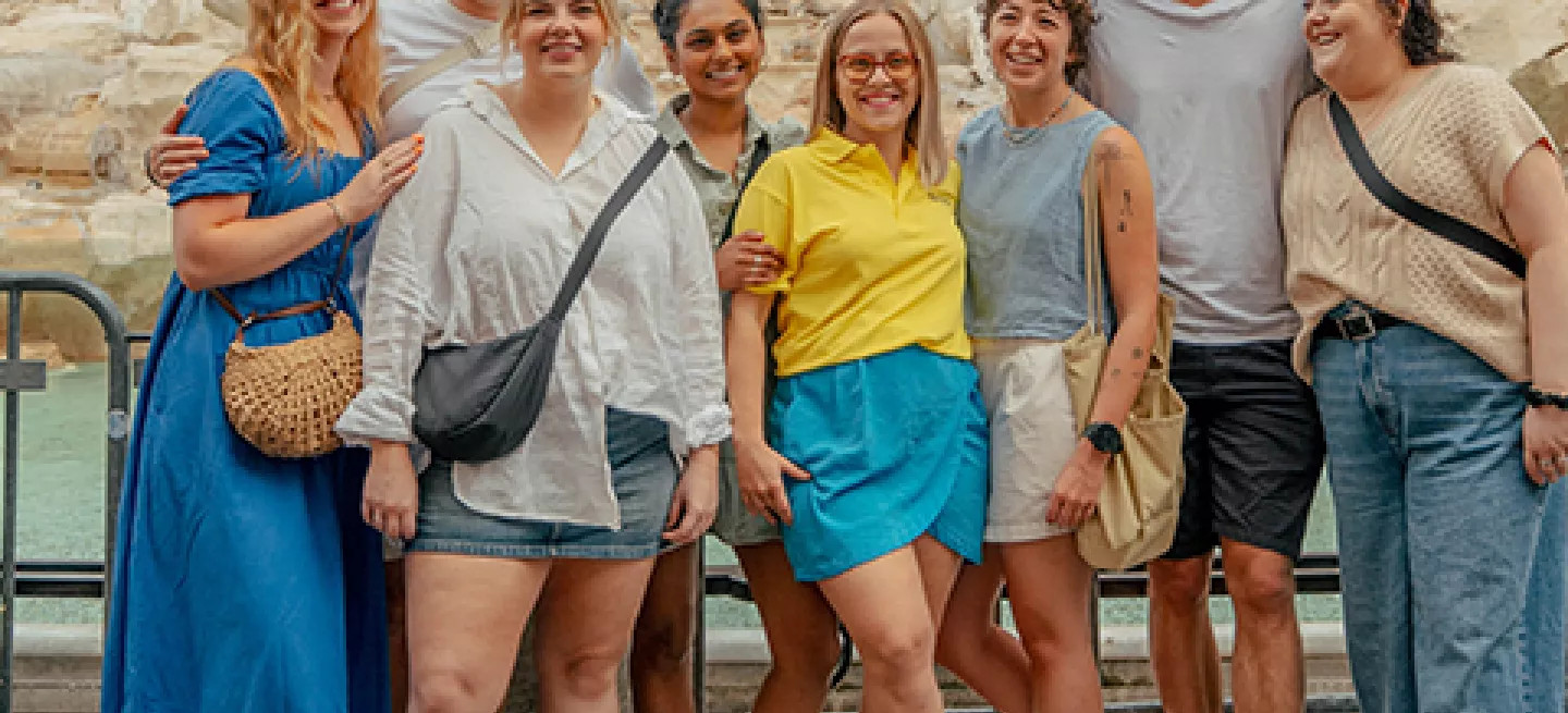 Topdeck customers in front of the Trevi Fountain in Rome - trip on sale now.