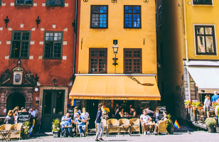 Colorful buildings line the busy streets of Stockholm.