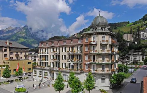 A view of the Hotel Schweizerhof in Engelburg, Switzerland. The Swiss Alps featuring in the background.