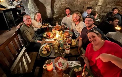 Topdeck travelers enjoying a traditional Bavarian meal.
