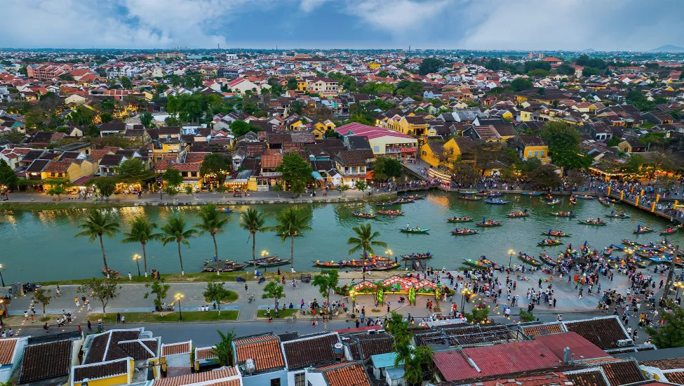 Buildings along the river in the town of Hoi An in Vietnam at night.