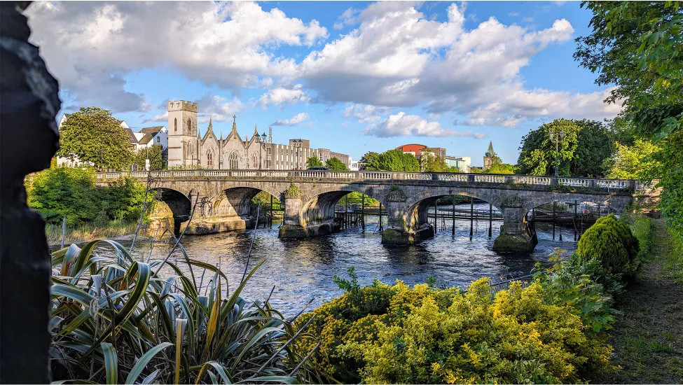 View of Salmon Weir Bridge in Galway City, Ireland.