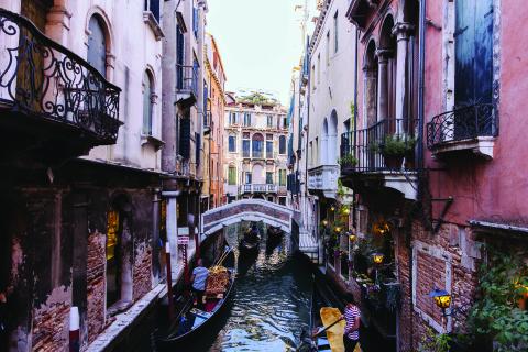 A boat going down the canal