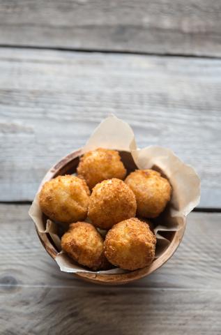 A bowl of Arancini