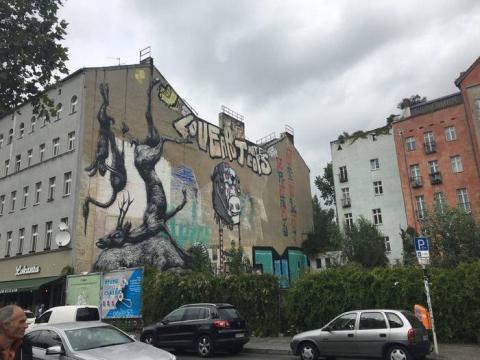 The side of the building showing street art in Berlin