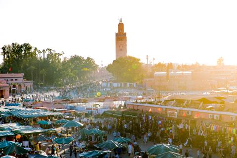 A Birds Eye view of a market, with lots of stands and people