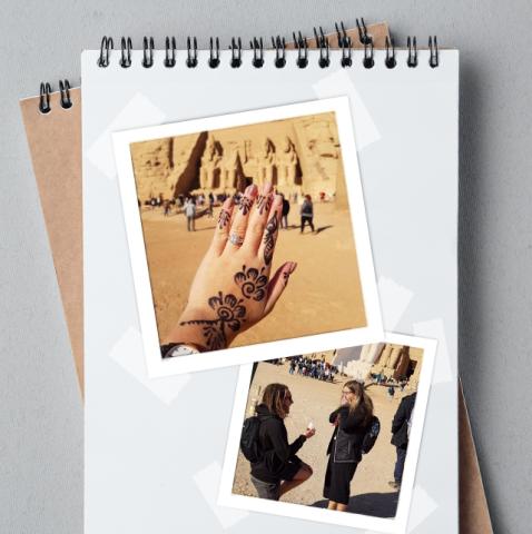 Notebook with 2 photographs in it. the first shows a woman's hand with an engagement ring on it. the second is her partner proposing to her