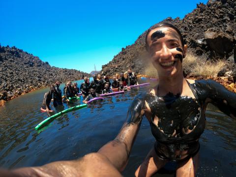 Group selfie of topdeckers in the ocean