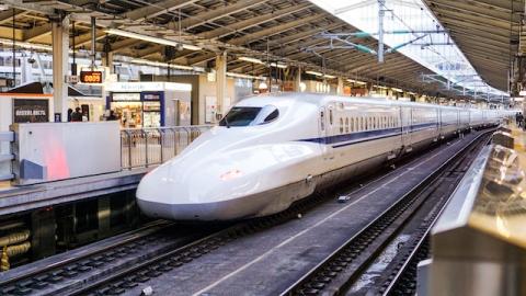 A bullet train at a platform