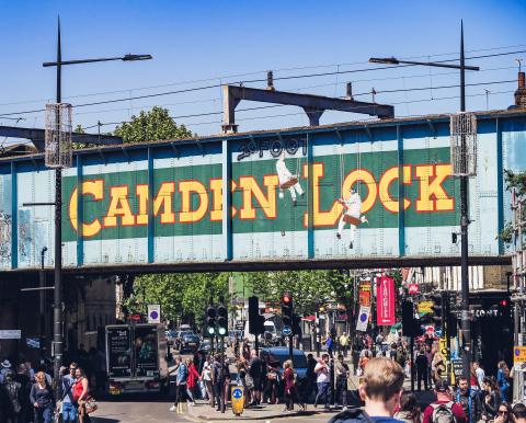 'Camden Lock' painted on a railway bridge in Camden