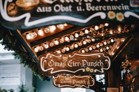 signs at a Christmas market bar