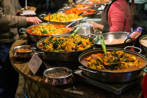 Pans of mixed veg curry ready to be served to customers