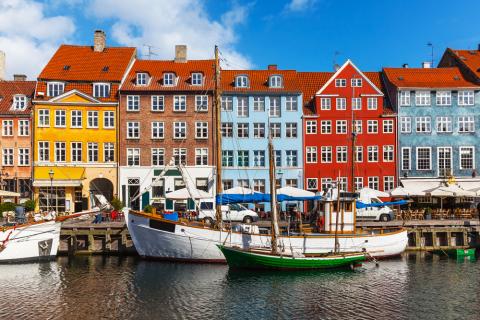 Colorful terraced houses in Copenhagen, with the Øresund in front