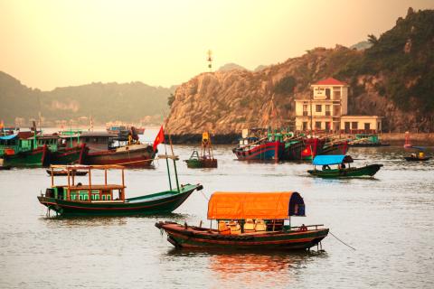 Boats floating on a body of water in Vietnam