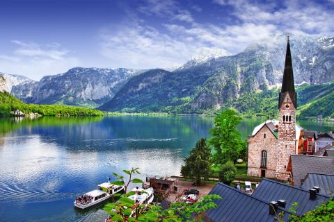 Mountains and houses surrounding a lake