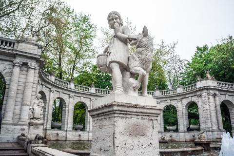 A statue of a girl and a wolf in Volkspark Friedrichshain park in Berlin, Germany