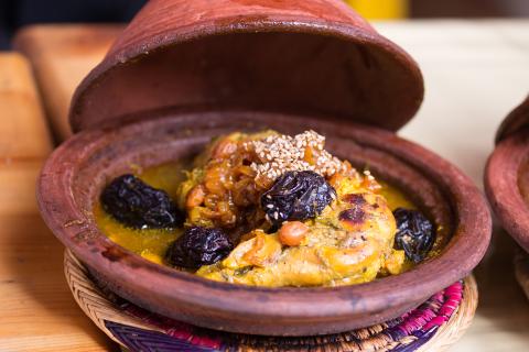 An earthenware pot with tagine served in it