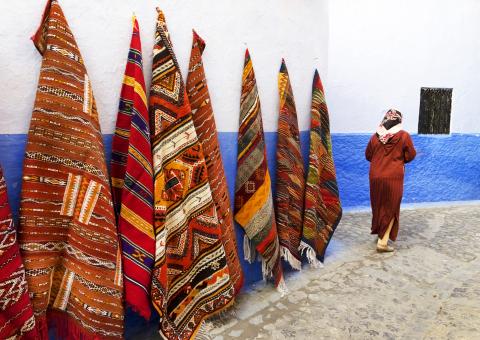Traditional blankets and materials sold in Morocco