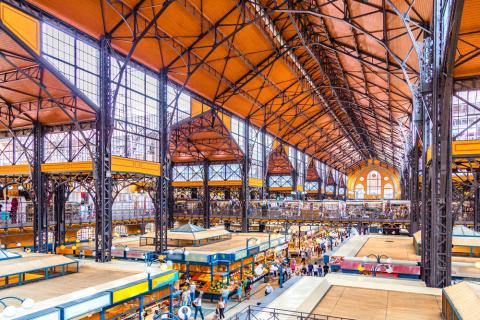 A huge hall with food markets in it