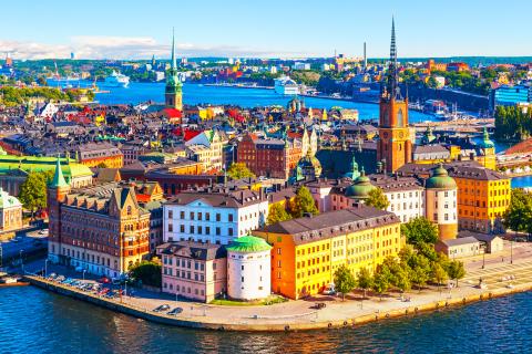 The city of Stockholm, showing houses lit up by the sun