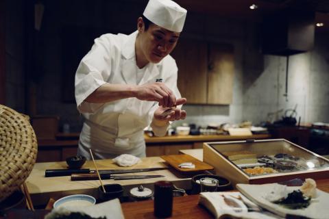 A chef preparing a meal