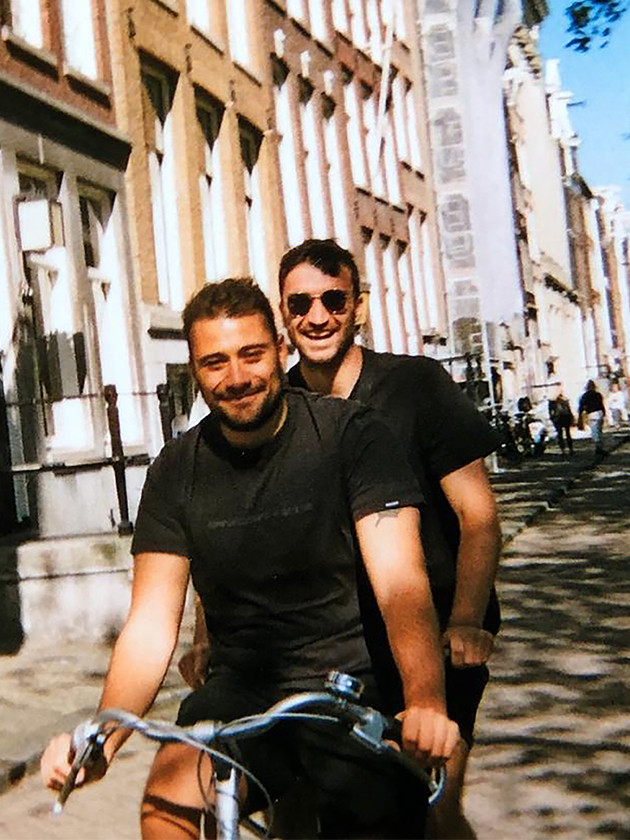 Two Topdeck travelers tandem cycling in Amsterdam.