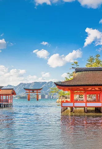 Tsukushima Shrine standing over the water near Miyajima Island.