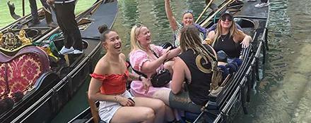 Topdeck Tour group having a great time as they embark on a gondola ride through the Canals of Venice.