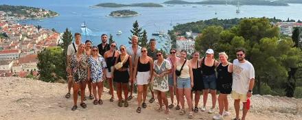 Topdeck travellers posing for a photo together.