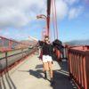 Woman standing on a bridge