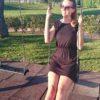 Woman sitting on a swing